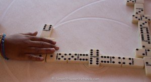 Child playing dominos