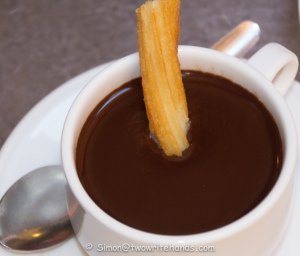 Churro Dipped into Hot Creamy Chocolate